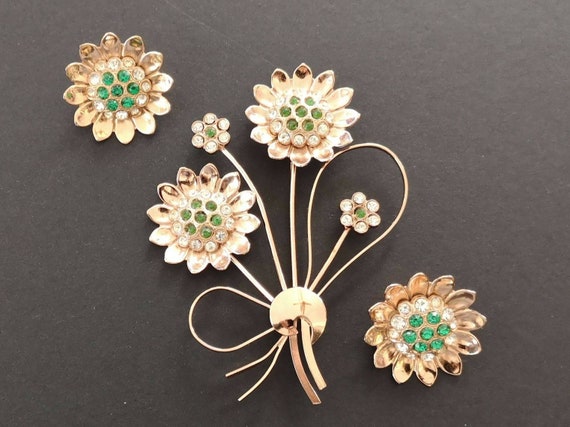Corocraft scatter brooches.