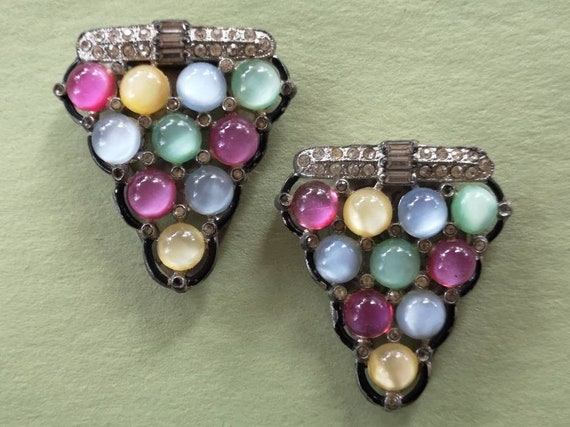 Art deco moonglow dress clips.