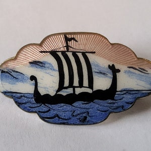 Norwegian guilloche enamel viking ship brooch