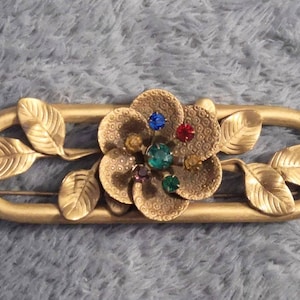 Czech brass and rhinestone brooch.