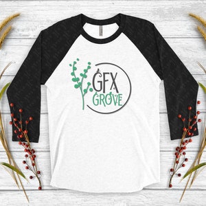May include: A white and black baseball tee shirt with a green graphic of a branch with leaves and the text "GFX GROVE" in a circle.