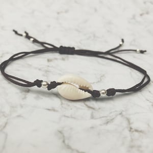 Cowrie shell bracelet ~ handmade friendship bracelet ~ adjustable charm bracelet.