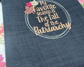 Broderad bokomslag med patriarkatets fall