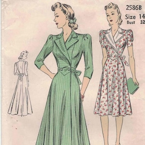 May include: A vintage Du Barry sewing pattern envelope, number 2586B, size 14, bust 32. The illustration displays two dress variations: a floor-length green pinstriped dress with a notched collar and a floral print dress with short sleeves.