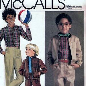 May include: A sewing pattern for boys' clothing from McCall's. The pattern includes instructions for making a plaid shirt, a corduroy jacket, and a pair of pants. The pattern is from Norton Simon Inc. Company.