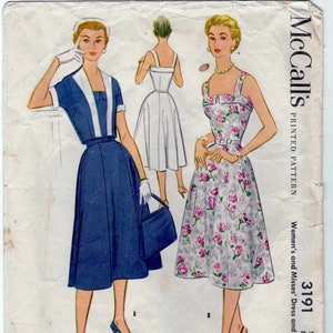 May include: Vintage McCall's sewing pattern for a dress and jacket. The pattern is for sizes 16 and bust 32. The pattern is printed on a white background with a blue and white dress and a floral print dress.