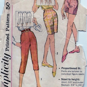 May include: A vintage sewing pattern for pants, with illustrations of three different styles. The pattern is for Simplicity Printed Pattern 50. The text on the pattern includes sizing information for short, medium, and tall heights.