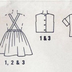 May include: A sewing pattern for a blouse and skirt. The pattern includes three different styles: a blouse with long sleeves, a blouse with short sleeves, and a skirt with pleats. The pattern is labeled with numbers 1, 2, and 3.