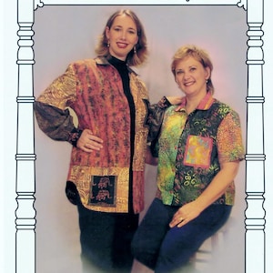 May include: Two women are modelling a colourful, patterned shirt. The shirt is described as "Going to Great Lengths" and "The Shirt worn 15 ways!" The shirt has a variety of patterns and colours, including pink, green, blue, and yellow. The shirt is made of fabric and has a button-up closure. The shirt is available in sizes S, M, L, XL, and XXL. The image is from Homestead Specialties.