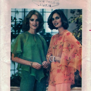 May include: Two women wearing different styles of tops and pants. The woman on the left is wearing a green top with a ruffled collar and matching pants. The woman on the right is wearing a peach top with a floral print and matching pants. The pattern on the top is a floral print with a peach background. The pattern on the pants is a solid peach color. The image is from a vintage sewing pattern. The pattern number is 5341 and the price is $1.50. The pattern is for a medium size.