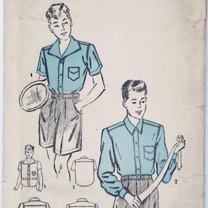 May include: A vintage sewing pattern for a boy's shirt, size 6, neck 11 1/2. The pattern includes instructions and diagrams for making a short-sleeved shirt with a button-down collar and a pocket. The pattern is printed on a light blue background with black text.