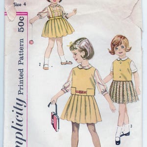 May include: Simplicity Printed Pattern 50c, child size 4, sewing pattern for a dress with a pleated skirt. The pattern shows three girls wearing different variations of the dress.