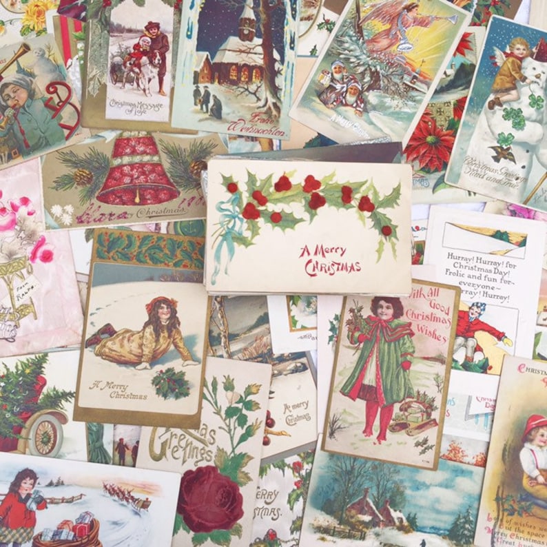 May include: A collection of vintage Christmas postcards featuring illustrations of winter scenes, children, and festive greetings. The cards are printed on thick paper with a variety of colours and designs. Some of the cards have a holly and berry border, while others have a more traditional Christmas tree design. The cards are in good condition and would make a great addition to any vintage Christmas collection.