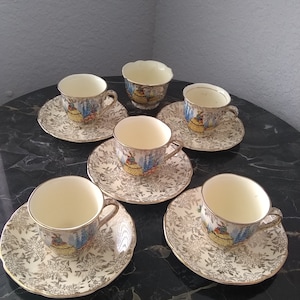 Shelton 1930&#39;s Ivory Empire England Crinoline Lady Gold Chintz Demitasse 11 piece tea set.