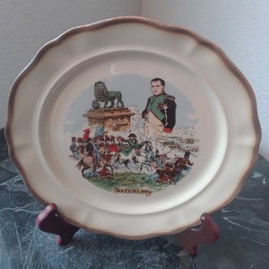 Souvenir of Belgique made in E.E.C. Waterloo Plate with Napoleon soldier&#39;s fighting Lion statue with 18 Juin 1815 on front Collectors Plate