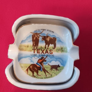 Texas souvenir individual ashtrays set of three in a ceramic holder vintage 1960s white with gold trim and two red stars on the holder