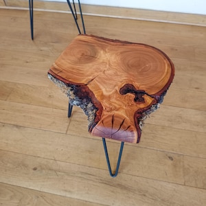 May include: A set of three ceramic mugs with a speckled, matte finish. The mugs are in shades of cream, light gray, and dark gray. Each mug has a simple, minimalist design, perfect for coffee or tea.