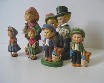 Mixed group of vintage ceramic (and one possibly wooden) child figurines