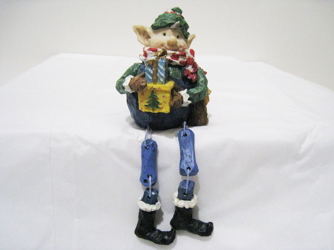 Christmas Shelf Sitter elf Holding Christmas Packages Wearing a Scarf