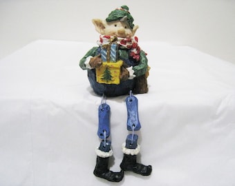 Christmas Shelf Sitter "Elf" Holding Christmas Packages Wearing a scarf