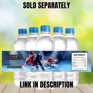 May include: Six clear plastic water bottles with blue caps and a label that says "Happy 3rd Birthday Jackson" with a hockey themed graphic. The label also includes a nutrition facts section with the heading "Birthday Nutrition Facts".