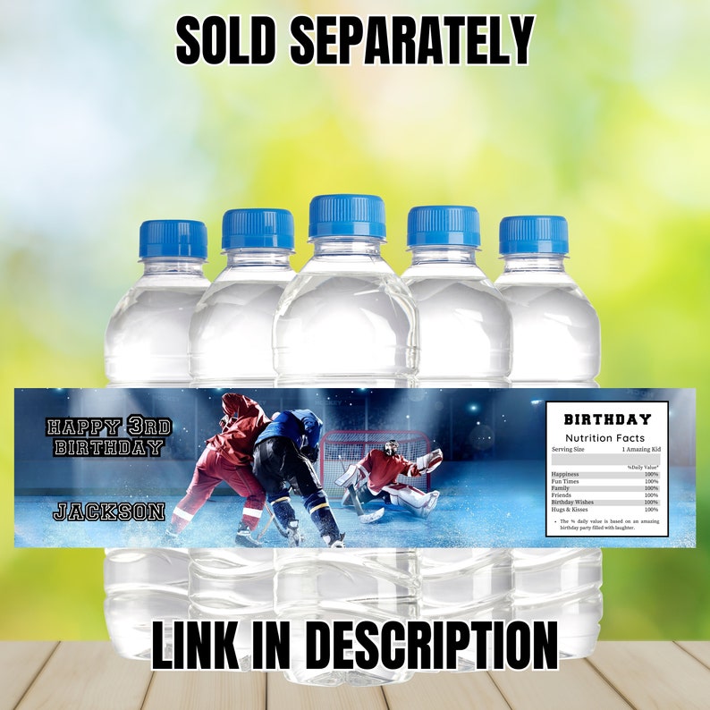 May include: Six clear plastic water bottles with blue caps and a label that says "Happy 3rd Birthday Jackson" with a hockey themed graphic. The label also includes a nutrition facts section with the heading "Birthday Nutrition Facts".