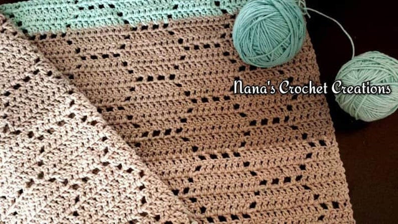 May include: A beige crochet blanket featuring a geometric openwork pattern and a light mint green border, accompanied by two matching mint green yarn balls. The text Nana's Crochet Creations is printed in white on the fabric surface.