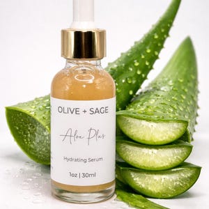 Organic aloe vera hydrating serum by Olive + Sage with fresh sliced aloe leaves, natural face serum for hydration and glowing skin
