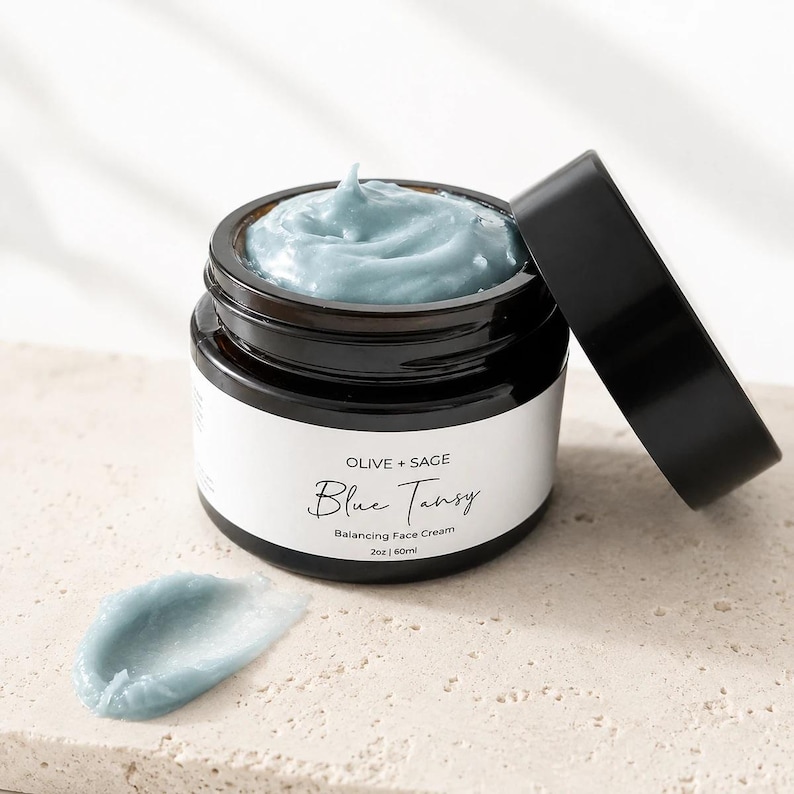 Blue tansy face cream texture with glass jar, waterless botanical moisturizer for dry sensitive skin