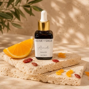 Acerola vitamin C face oil bottle with citrus and berry ingredients, lightweight facial serum for glow