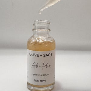 Hydrating face serum dropper application showing lightweight aloe-based botanical serum texture for smooth, nourished skin