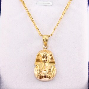 egyptian necklace egypt gold pendant
pharaoh pendant  tut pendant
egyptian king tut king tut pendant
egyptian tut 18K gold pendant
King Tut Pharaoh Jewelry
Tutankhamun pendant
Handmade jewelry
mythology jewelry
pharaonic pendant
tut mask penda