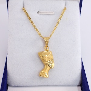 Gold Egyptian Charm
handmade jewelry
18K Gold Pendants
egyptian jewelry
egyptian necklace
pharaoh pendant
egypt gold pendant
gold pendant chain
18K gold pendant
egyptian nefertiti
nefertiti pendant
Queen Nefertiti
18k gold chain
Nefertiti necklace