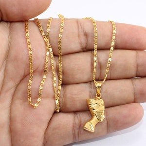 Gold Egyptian Charm
handmade jewelry
18K Gold Pendants
egyptian jewelry
egyptian necklace
pharaoh pendant
egypt gold pendant
gold pendant chain
18K gold pendant
egyptian nefertiti
nefertiti pendant
Queen Nefertiti
18k gold chain
Nefertiti necklace