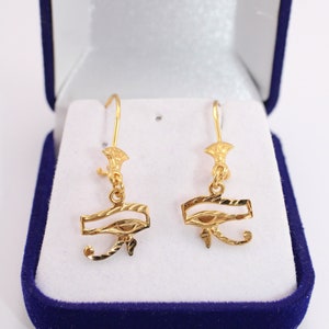 Egyptian Solid Gold 18K Earring Eye Of Horus Stamped Pharaonic Yellow Gold handmade jewelry
egyptian jewelry
ancient Egypt
Eye of Horus Earring
eye of ra
evil eye Earring
Solid Gold 18K
Gold Stamped
Eye of Horus
Stamped Earring
18K gold
evil eye