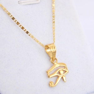 Gold Egyptian Charm
handmade jewelry
custom jewelry
women's gifts
Egyptian Necklaces
evil eye Necklaces
eye of horus charm
Eye Horus necklace
gold necklace chain
Handmade Necklace
evil eye pendant
mythology jewelry
evil eye necklace
Horus charm