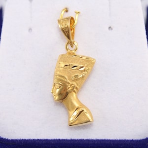 Gold Egyptian Charm
handmade jewelry
18K Gold Pendants
egyptian jewelry
egyptian necklace
pharaoh pendant
egypt gold pendant
gold pendant chain
18K gold pendant
egyptian nefertiti
nefertiti pendant
Queen Nefertiti
18k gold chain
Nefertiti necklace