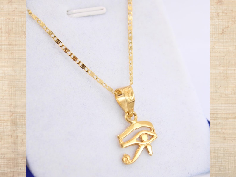 Gold Egyptian Charm
handmade jewelry
custom jewelry
women's gifts
Egyptian Necklaces
evil eye Necklaces
eye of horus charm
Eye Horus necklace
gold necklace chain
Handmade Necklace
evil eye pendant
mythology jewelry
evil eye necklace
Horus charm