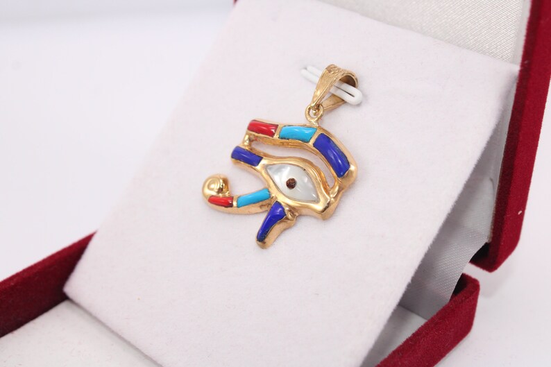handmade jewelry
Egyptian Pendant
egyptian jewelry
ancient Egypt
Eye of Horus pendant
egypt gold pendant
gold pendant chain
eye of ra
Eye Horus necklace
egyptian necklace
eye of horus charm
18K gold pendant
evil eye pendant
mythology jewelry