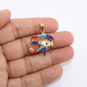 handmade jewelry
Egyptian Pendant
egyptian jewelry
ancient Egypt
Eye of Horus pendant
egypt gold pendant
gold pendant chain
eye of ra
Eye Horus necklace
egyptian necklace
eye of horus charm
18K gold pendant
evil eye pendant
mythology jewelry