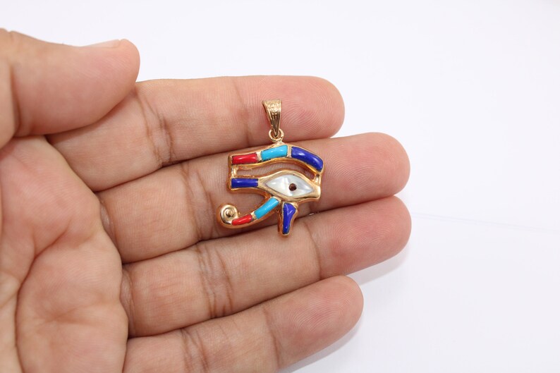 handmade jewelry
Egyptian Pendant
egyptian jewelry
ancient Egypt
Eye of Horus pendant
egypt gold pendant
gold pendant chain
eye of ra
Eye Horus necklace
egyptian necklace
eye of horus charm
18K gold pendant
evil eye pendant
mythology jewelry