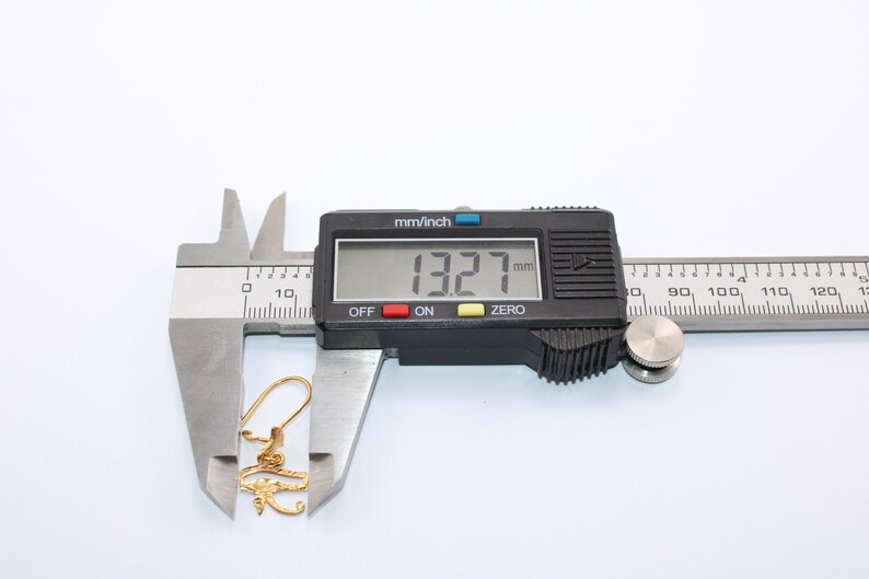 Egyptian Solid Gold 18K Earring Eye Of Horus Stamped Pharaonic Yellow Gold handmade jewelry
egyptian jewelry
ancient Egypt
Eye of Horus Earring
eye of ra
evil eye Earring
Solid Gold 18K
Gold Stamped
Eye of Horus
Stamped Earring
18K gold
evil eye