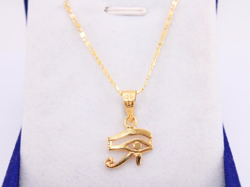 Gold Egyptian Charm
handmade jewelry
custom jewelry
women's gifts
Egyptian Necklaces
evil eye Necklaces
eye of horus charm
Eye Horus necklace
gold necklace chain
Handmade Necklace
evil eye pendant
mythology jewelry
evil eye necklace
Horus charm