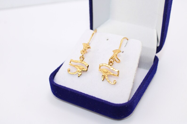 Egyptian Solid Gold 18K Earring Eye Of Horus Stamped Pharaonic Yellow Gold handmade jewelry
egyptian jewelry
ancient Egypt
Eye of Horus Earring
eye of ra
evil eye Earring
Solid Gold 18K
Gold Stamped
Eye of Horus
Stamped Earring
18K gold
evil eye