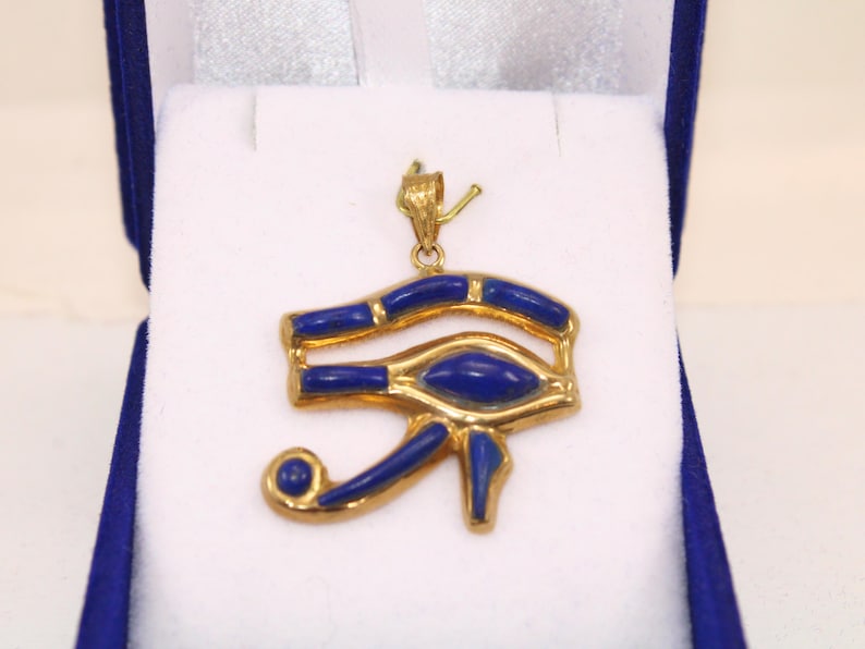 handmade jewelry
Egyptian Pendant
egyptian jewelry
ancient Egypt
Eye of Horus pendant
egypt gold pendant
gold pendant chain
eye of ra
Eye Horus necklace
egyptian necklace
eye of horus charm
18K gold pendant
evil eye pendant
mythology jewelry