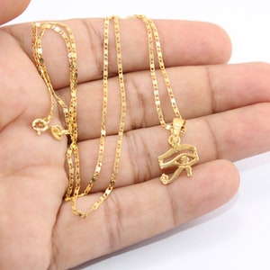 Gold Egyptian Charm
handmade jewelry
custom jewelry
women's gifts
Egyptian Necklaces
18K Gold Necklaces
women's Necklaces
Egyptian jewelry
eye of ra
evil eye Necklaces
eye of horus charm
Eye Horus necklace
gold necklace chain
