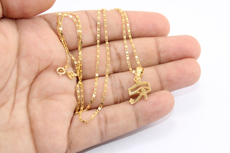 Gold Egyptian Charm
handmade jewelry
custom jewelry
women's gifts
Egyptian Necklaces
18K Gold Necklaces
women's Necklaces
Egyptian jewelry
eye of ra
evil eye Necklaces
eye of horus charm
Eye Horus necklace
gold necklace chain