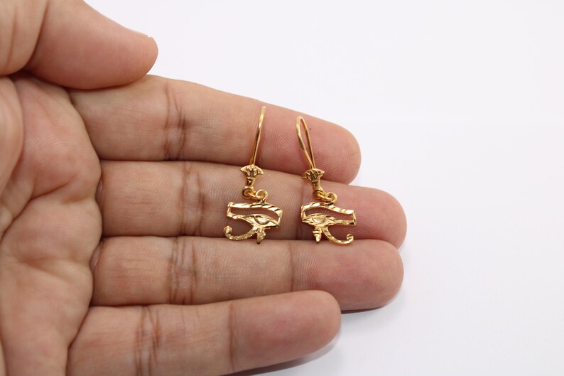 Egyptian Solid Gold 18K Earring Eye Of Horus Stamped Pharaonic Yellow Gold handmade jewelry
egyptian jewelry
ancient Egypt
Eye of Horus Earring
eye of ra
evil eye Earring
Solid Gold 18K
Gold Stamped
Eye of Horus
Stamped Earring
18K gold
evil eye