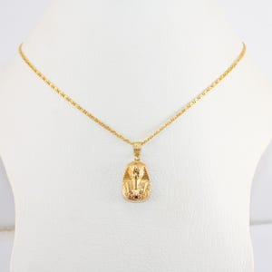 egyptian necklace egypt gold pendant
pharaoh pendant  tut pendant
egyptian king tut king tut pendant
egyptian tut 18K gold pendant
King Tut Pharaoh Jewelry
Tutankhamun pendant
Handmade jewelry
mythology jewelry
pharaonic pendant
tut mask penda