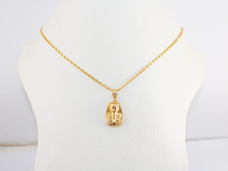 egyptian necklace egypt gold pendant
pharaoh pendant  tut pendant
egyptian king tut king tut pendant
egyptian tut 18K gold pendant
King Tut Pharaoh Jewelry
Tutankhamun pendant
Handmade jewelry
mythology jewelry
pharaonic pendant
tut mask penda